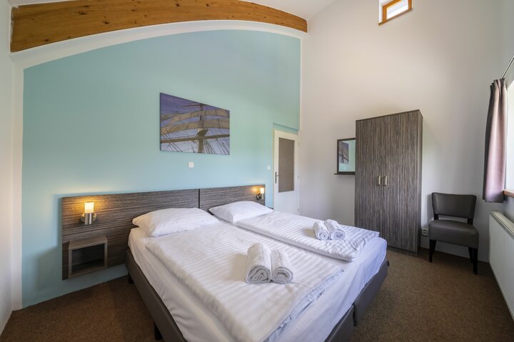 Buitenhof Reizen voor mensen met een verstandelijke beperking - Landal Marina Lipno - slaapkamer