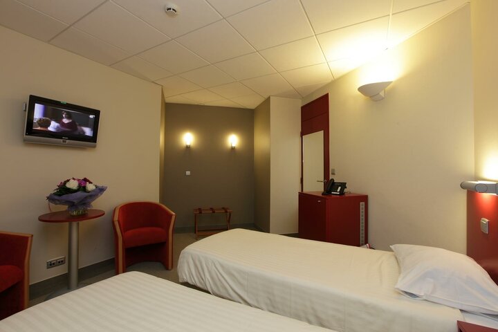 Buitenhof Reizen begeleide vakanties voor mensen met een verstandelijke beperking - © Hotel Floreal - Voorbeeld slaapkamer Buitenhof Reizen begeleide vakanties voor mensen met een verstandelijke beperking - © Hotel Floreal - Voorbeeld slaapkamer