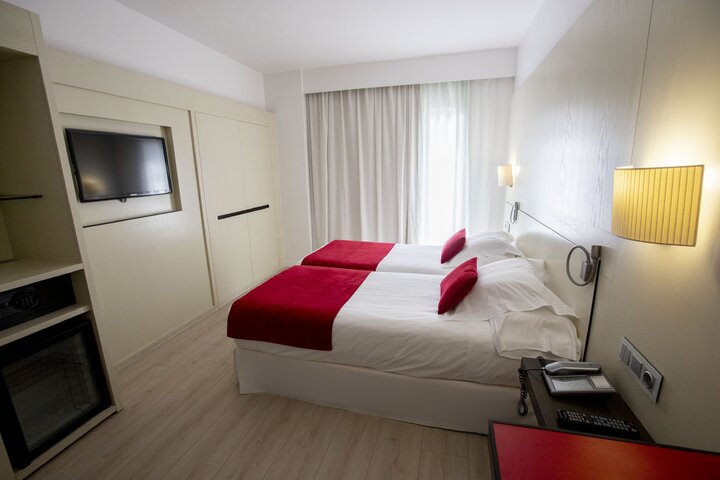 Buitenhof Reizen voor mensen met een verstandelijke beperking - Hotel Gravina voorbeeld slaapkamer 2