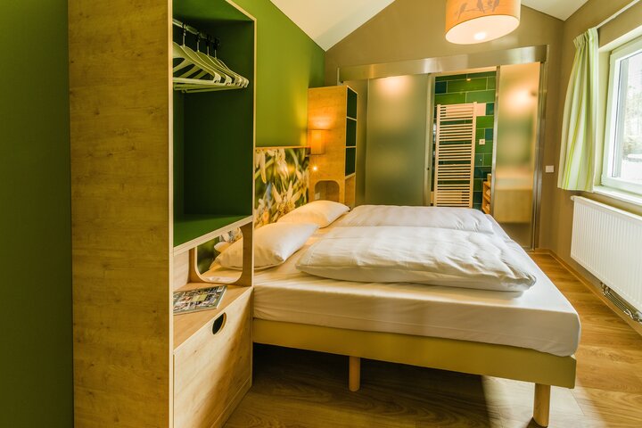 Buitenhof Reizen voor mensen met een verstandelijke beperking- Center Parcs Allgau - slaapkamer