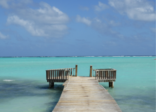 Buitenhof Reizen voor mensen met een verstandelijke beperking - Ondernemend - Bonaire - zee met loopstuk Buitenhof Reizen voor mensen met een verstandelijke beperking - Ondernemend - Bonaire - zee met loopstuk