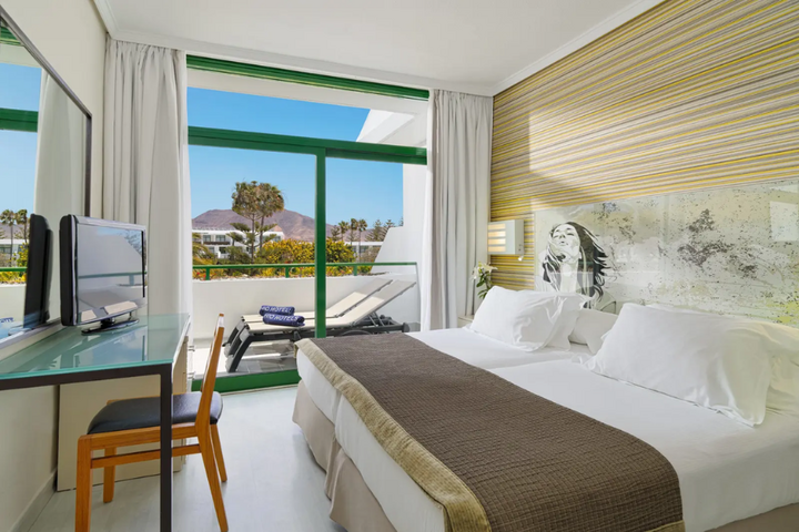 Buitenhof Reizen - Lanzarote - begeleide vakanties voor mensen met een beperking - H10 Lanzarote Princess slaapkamer voorbeeld Buitenhof Reizen - Lanzarote - begeleide vakanties voor mensen met een beperking - H10 Lanzarote Princess slaapkamer voorbeeld