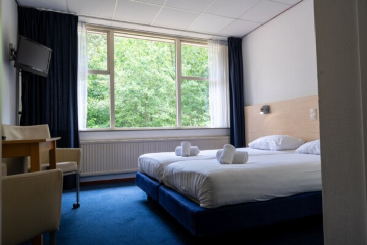 Buitenhof Reizen - Steenwijk - begeleide vakanties voor mensen met een beperking - Buitengoed Fredeshiem slaapkamer Buitenhof Reizen - Steenwijk - begeleide vakanties voor mensen met een beperking - Buitengoed Fredeshiem slaapkamer