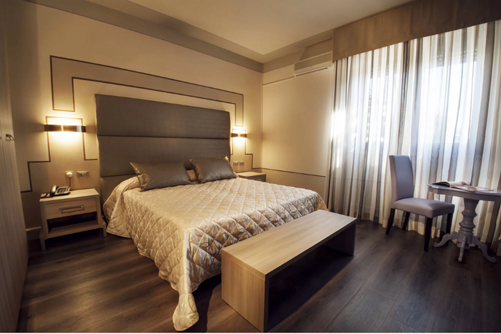 Buitenhof Reizen - Gardameer - begeleide vakanties voor mensen met een beperking - Conca d'Oro Hotel slaapkamer voorbeeld Buitenhof Reizen - Gardameer - begeleide vakanties voor mensen met een beperking - Conca d'Oro Hotel slaapkamer voorbeeld