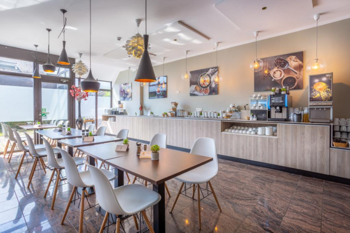 Buitenhof Reizen - Kerst in de Eifel - begeleide groepsreizen met een verstandelijke beperking - Hotel Am Stad ontbijtrestaurant