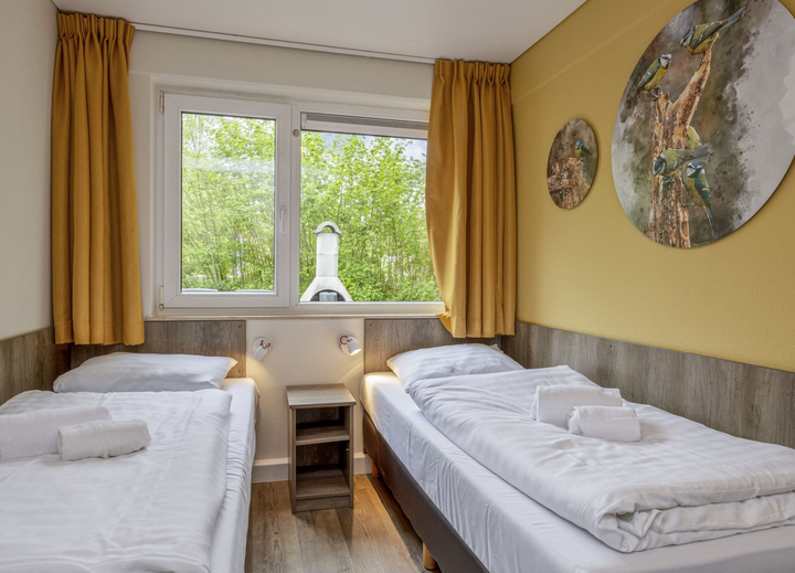 Buitenhof Reizen voor mensen met een verstandelijke beperking - Landal Sonnenberg - slaapkamer